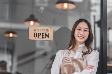 A friendly shopkeeper stands proudly in front of a shop, showcasing an 