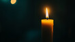 © VASSELL TRADING - single burning candle in the dark - hope, faith, remembrance, religious, spiritual