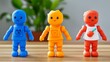 © Aris Suwanmalee - Colorful toy figures in a playful arrangement creating a cheerful atmosphere, perfect for kids' decor or educational themes.