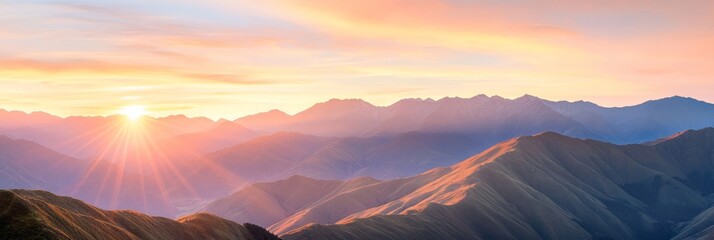 Wall Mural -  A scene of a mountain range with the sun piercing clouds, mountains positioned before the camera