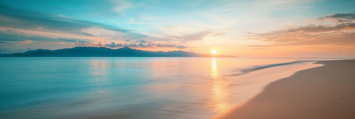 Wall Mural -  The sun sets over the ocean, with a beach in the foreground and a mountain range Distancing..Or, to maintain a more natural flow:..The sun sets