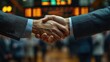 © Ummeya - Executive Shaking Hands After Finalizing a Successful Business Deal