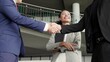 © NT_studio - Group young business man and woman meeting and discussing and handshake for congratulating office, businessman planning with partner or consulting, teamwork and colleagues, business and team concept.