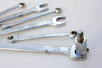 Open-Ended Wrench: Has two open ends, with one size on each end. One of the most popular kinds, often used for general tasks.