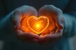 © Nikolai - Hands holding glowing heart, symbol of love and care.