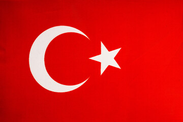 National flag of the state of Turkye close-up. State background.