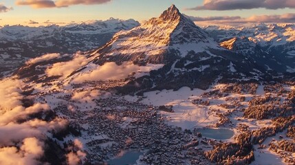 Sticker -   An aerial view of a snow-capped mountain range with clouds in the foreground