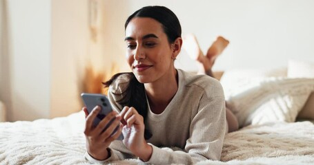 Poster - Happy woman, relax and lying with phone on bed for social media, online browsing or scrolling news at home. Young, female person or user with smile on mobile smartphone for communication in bedroom