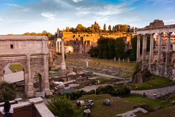 Wall Mural - Rome city, Italy. Ancient ruins in evening sun