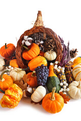 Poster - Thanksgiving cornucopia filled with autumn vegetables, pumpkins and fall decor. Front facing view, isolated on a white background.