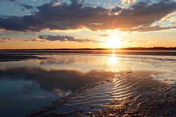 Poster - Sunset over a calm lake with dramatic clouds in the sky