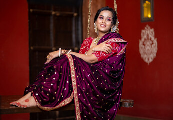 Graceful Ease: A Marathi Woman in a Nauvari Saree, Radiating Elegance