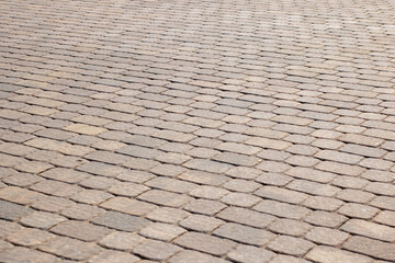 Closeup of a brick pavement with a diagonal pattern