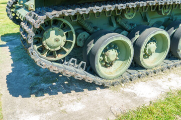 A Soviet military tank. Dynamic protection on the tank body. Elements of an armored vehicle in close-up, tracks and a cannon.