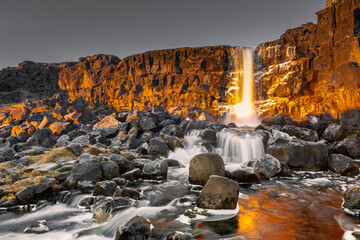 landscape of oxararfoss waterfall in thingvellir national park, iceland. oxararfoss waterfall is the