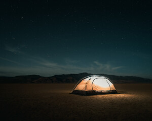 desert tent camping under the night sky