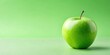 © Nasnunt - Fresh green apple with black stem on pastel green surface against vibrant pink background, apple, fresh, green, black, stem