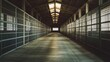 © BerkahStock - A spacious, well-lit corridor in a building with metal bars and concrete flooring.