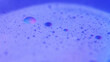 © golubovy - Bubble fluid. Foam swirl. Defocused neon purple blue color oil emulsion texture paint water mix abstract art background.