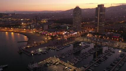 Wall Mural - Picturesque evening aerial view of coastal area of Barcelona overlooking Olympic Harbor marina with moored pleasure yachts and modern architecture of waterfront in summer, Spain