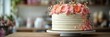 © paisorn - Elegant cake adorned with vibrant flowers, set against a softly blurred, inviting bakery interior, showcasing exquisite craftsmanship and detail.