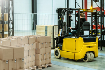 Poster - warehouse forklift at work. man operates machine for loading pallets. warehouse with boxes inside in