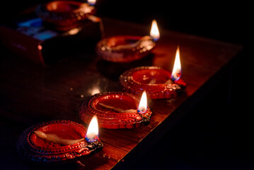 Happy Diwali - Beautiful diwali diya lamps lit during diwali celebration. Indian festival diwali