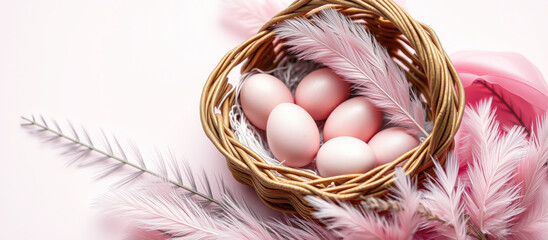 Poster - Pastel Pink Easter Eggs in a Wicker Basket with Feathers