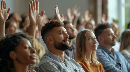 Wall Mural - Active diverse multiracial male female audience. Side profile view mixed race multiethnic men and women sitting in row raising up hands to ask coach question after engaging talk, se