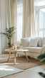 © VERTEX SPACE - A modern minimalist living room in cream tones features cozy sofa adorned with soft cushions, stylish round coffee table, and touch of greenery from potted plant. natural light enhances serene atmosph