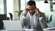 © HadK - Concerned Financial Advisor Discussing Delayed Payments in Modern Office Setting