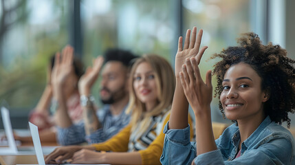 Wall Mural - Young colleagues raising hands to ask questions during business meeting sitting back in office. Diverse business people voting at the conference in meeting room listening their spea