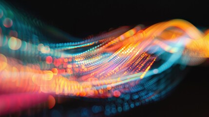 Poster - A vibrant display of swirling light trails in shades of pink, orange, and blue creates a mesmerizing abstract composition full of movement