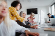 © Halfpoint - Portrait of female senior students learning how to work with digital technology. Elderly people attending computer and technology education class. Digital literacy.