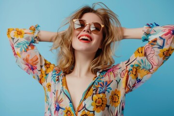 a woman wearing trendy sunglasses and a colorful floral shirt, suitable for fashion or lifestyle use