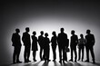 © Introvertia - Group of business professionals in silhouette highlighting unity and purpose