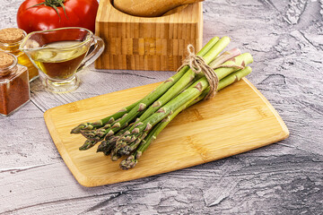 Vegan raw green asparagus heap