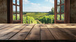 © Sawyer0 - Pusty drewniany stół, który zachęca do aranżacji produktów, z otwartym oknem oferującym wspaniały widok na zielone winnice.