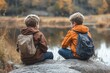 © Rising Monk - School kids boys having a conflict quarrel sitting on a rock boulder in the city forest park and turned their backs to each other. Brothers siblings dispute beef at each, Generative AI