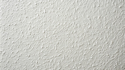 Poster - A monochromatic wall surface exhibits a richly textured white finish, highlighting detailed patterns and a tactile quality that enhances interior design aesthetics