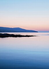 Wall Mural - Peaceful Sea Under Pastel Sky at Sunset