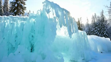 Aufkleber - Sun shining through turquoise ice formations in snowy forest. Creating magical winter scene. Blue light bathes landscape as sunlight filters through frost covered trees. Illuminating crystal like ice