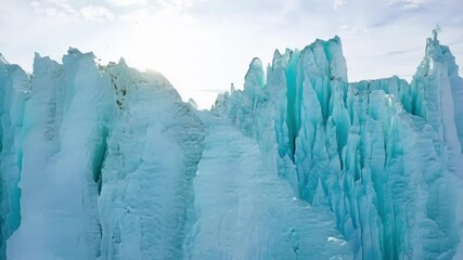 Aufkleber - Jagged turquoise ice formations are towering over the frozen landscape, creating a mesmerizing spectacle of nature's artistry in a winter wonderland
