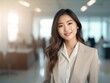 © Human AI - Portrait Attractive Asian young confident business woman in business professional working office