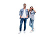 © deagreez - Full body photo of pretty man and woman with eyewear eyeglasses smiling wearing denim jeans jacket isolated over blue background