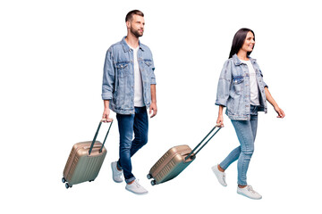 Wall Mural - Full body profile side photo of lovely spouses holding trolley wearing denim jeans jackets isolated over blue background