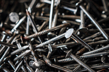 Close up of iron nails background , Piles of iron nails used in carpentry