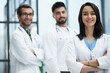 © Katsiaryna - Attractive female doctor in front of medical stuff in hospital