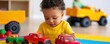 © JAYDA RIN - Toddlers happily playing with toy cars and trucks on a colorful play mat at daycare   imaginative play, daycare fun