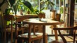 © VK Studio - A sun-drenched table in a cozy café, surrounded by lush greenery and warm light filtering through large windows, exuding a homely atmosphere.